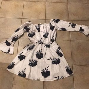 White dress with black flowers